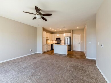 Living room facing kitchen