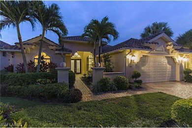 Elegant entry with night lighting.
