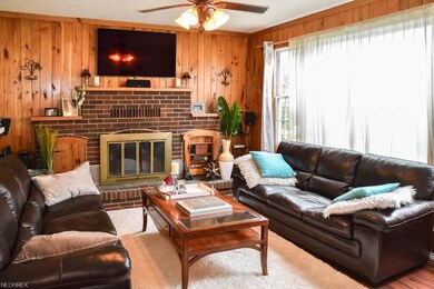 Gorgeous, sun-filled family room with a picture wi
