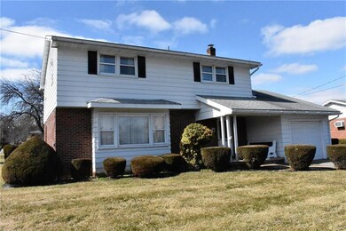 Partial brick front, covered porch, bay window, 1 