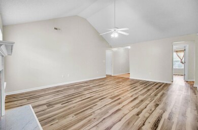 Family room with vaulted ceiling