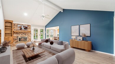 Living room with high vaulted ceiling, a brick fireplace, wood finished floors, a chandelier, and beam ceiling