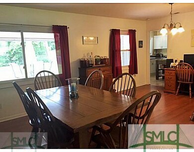 Living Room. Updated wood laminate flooring in the