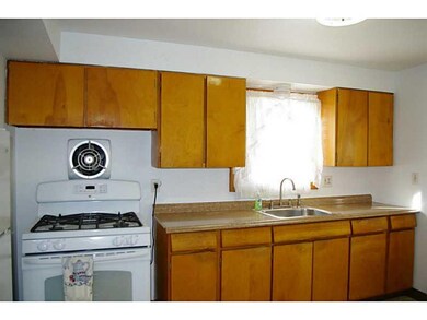Kitchen. Kitchen features oak cabinets, gas stove 