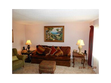 Family Room-L1. Large family room features fresh p
