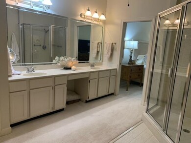 Bathroom featuring tile patterned floors, walk in 