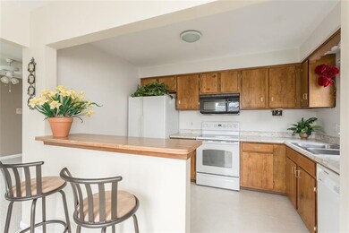 The compact kitchen has plenty of work space with 
