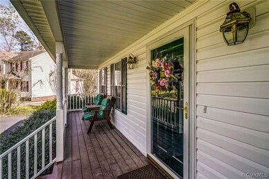 Front porch is perfect for relaxing a spell!