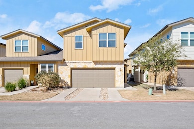 View of front of house featuring an attached gara