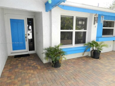 View of front door from inside front gate