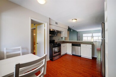 Kitchen featuring appliances with stainless steel