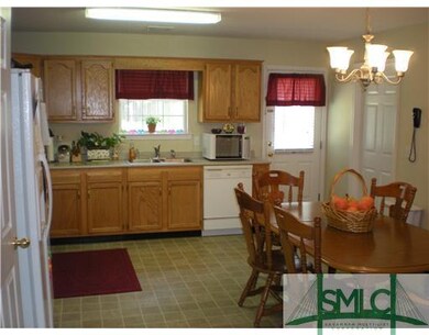 Kitchen. Open to the kitchen is the dining area th