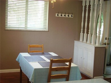 Dining room has breakfast counter that looks into 