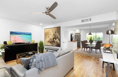 Living room featuring light hardwood / wood-style 