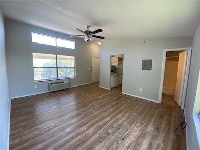This living area contains beautiful new flooring. 