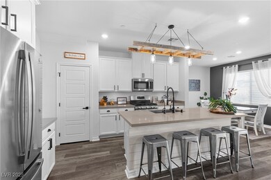 Kitchen with extensive cabinetry and counter seating.