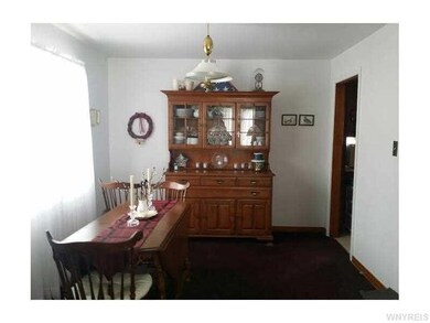 Dining Room. Hardwood floors under carpet