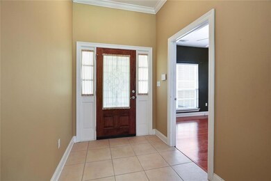 Foyer that leads to 4th bedroom or office