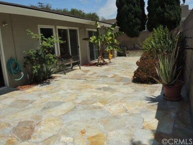 Very large, walled flagstone Patio off Living room