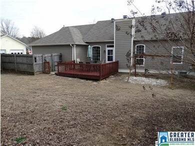 Backyard has great space to relax and play.