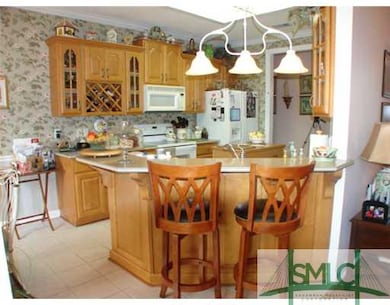 Kitchen. Appliances included:  smooth top range, d