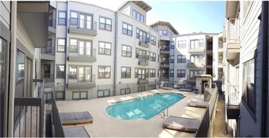 Community pool with a patio area