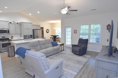 Living room featuring light hardwood / wood-style 