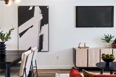 Living room *Photo of model home at 21 Rose
