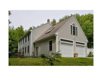 Exterior Front. Large garage with...