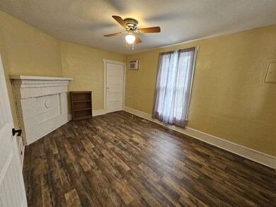 The door leads into the kitchen