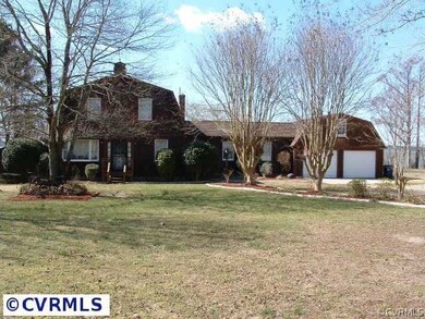 Front of home and 2 car garage.