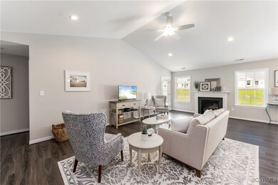 Living room featuring a wealth of natural light, c