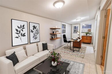 Tiled living room with vaulted ceiling