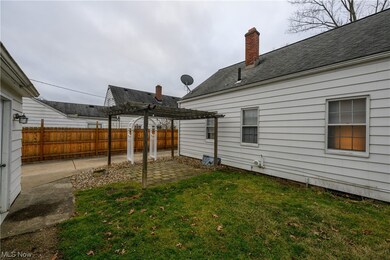 View of yard with a pergola and a patio