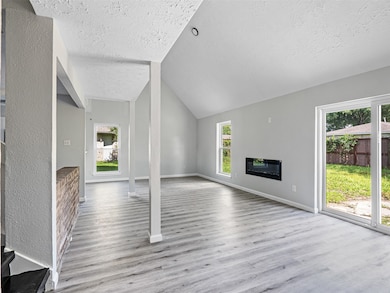 Bright and inviting living room with brand-new flo