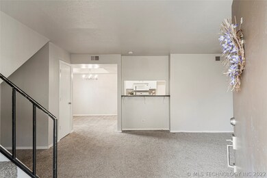 This condo is bright and airy. Cozy carpet and a n