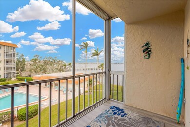 Enclosed lanai with views of the Manatee River and heated pool