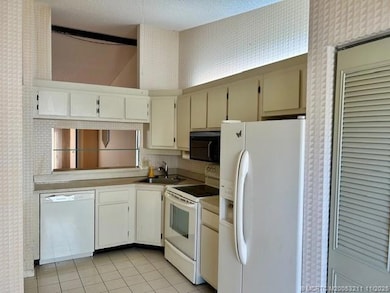 1544 SW Silver Pine Way unit 104G, Palm City, FL 34990 - photo 4