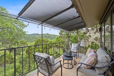 Balcony with a view of trees