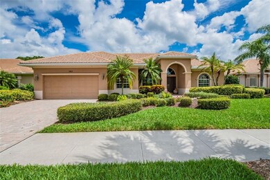 Beautiful Palm Fringed Curb Appeal. Paver Drive an