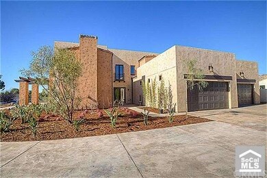 The oversized 4 car garage could even accommodate 