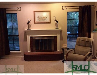 Den/Family/Great Room. Pretty mantle and wood-burn