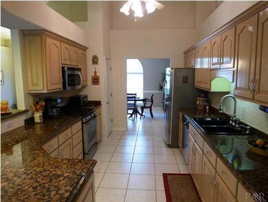 Granite counters, plentiful cabinets, newer appliances, pantry...
