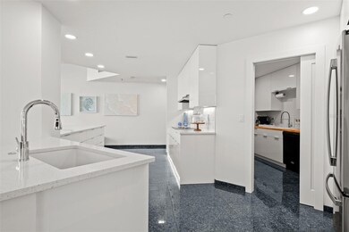 View Of Both Kitchens.