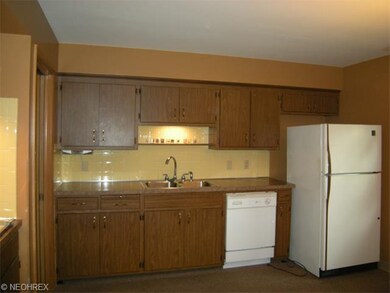 Large eat-in-kitchen offers ample cupboards and co