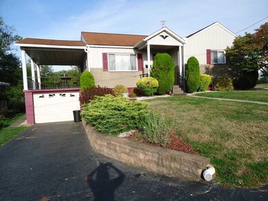 Exterior Front. Attached garage with covered porch