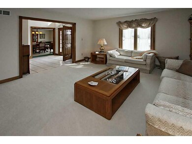 Living Room. The Living Room opens to Entry and offers plenty of floor space for personalization with furniture placement.