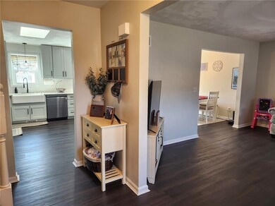 Brand new kitchen, dining room, and living room on