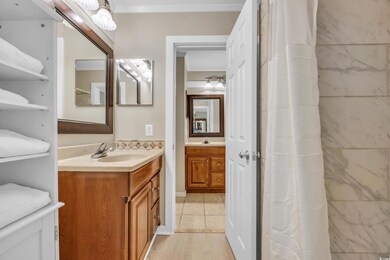 Bathroom featuring vanity and walk in shower