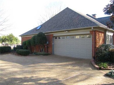 A 2-car garage is located to the side of the home 